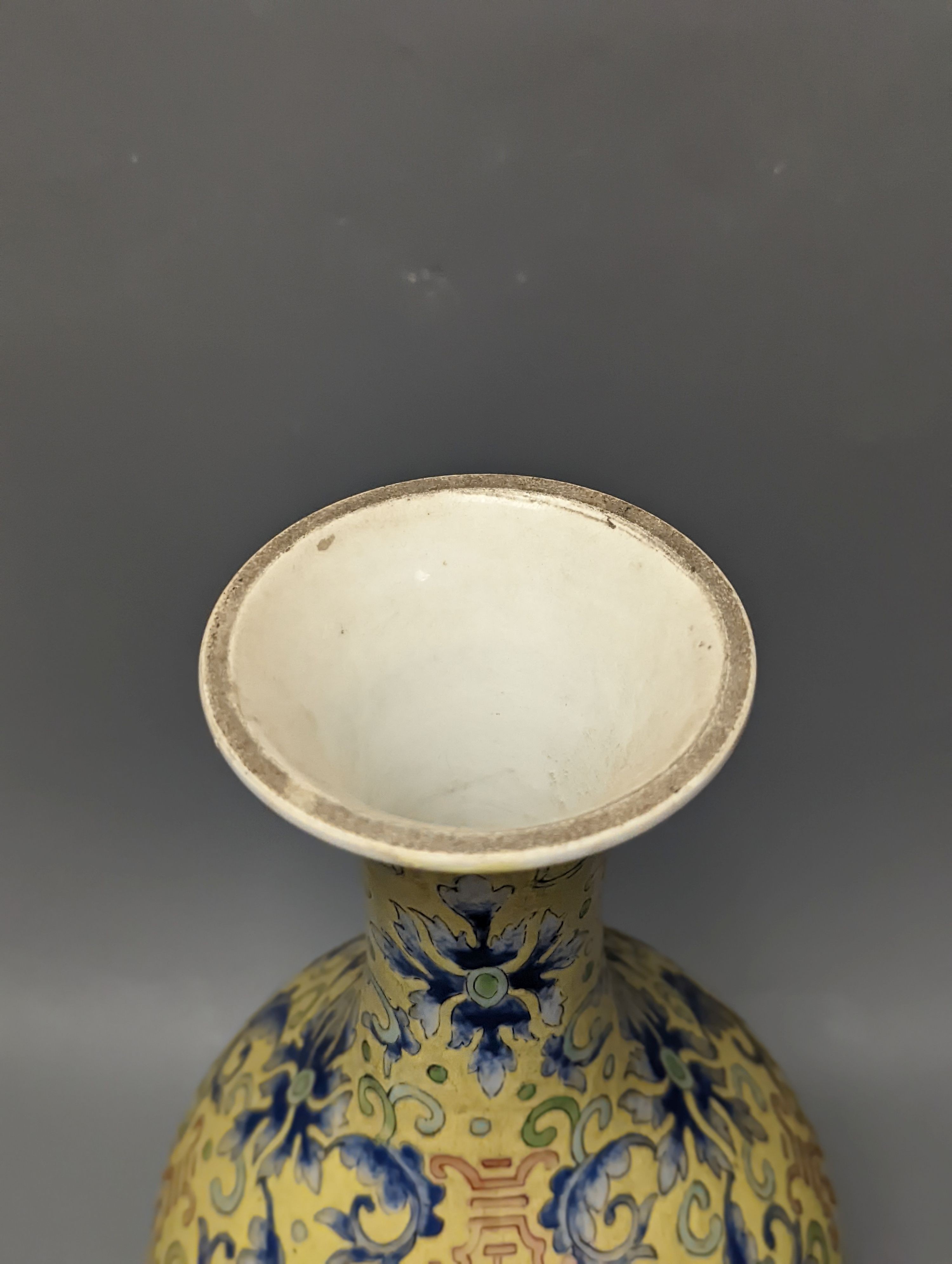 A Chinese yellow ground vase, raised on a gilt bronze base 38cm